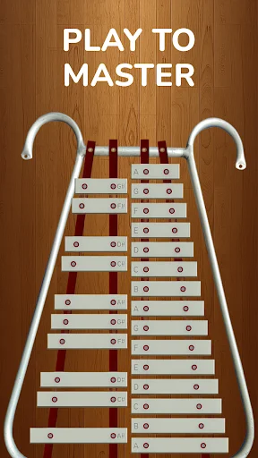 Play to Master screen in Lyre app displaying full xylophone instrument with metal bars and mallets for music learning
